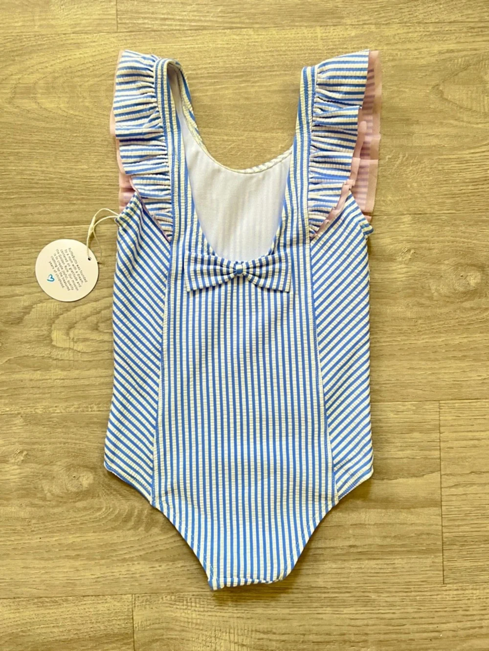 RuffleButts Waterfall Swimsuit Girls Seersucker Blue Stripe Ruffle Bow UPF50